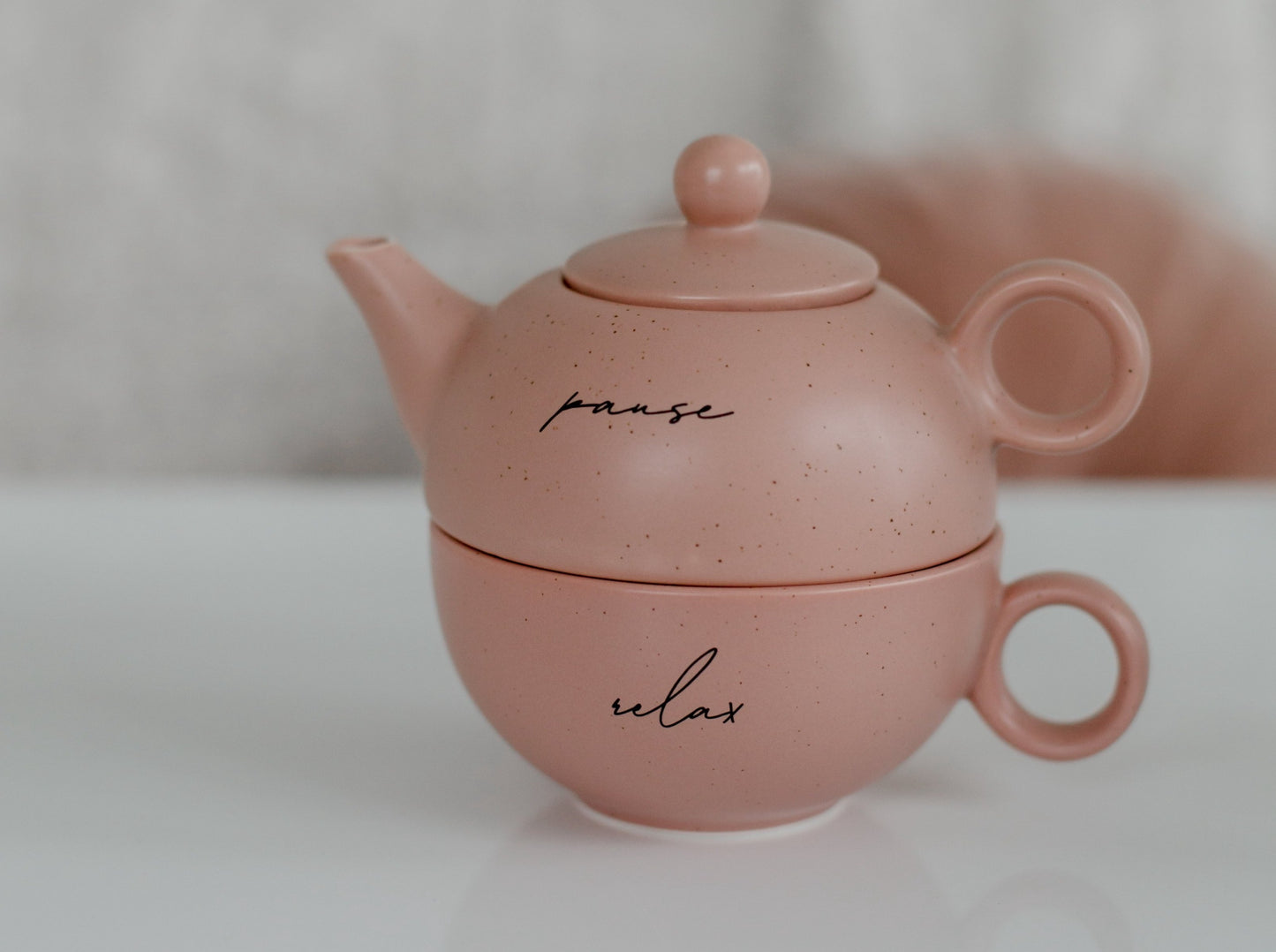Pink ceramic tea pot