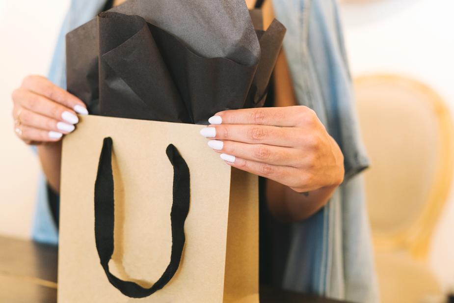 A woman holding a shopping bag